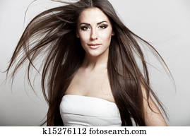 beautiful young brunette woman with long hair