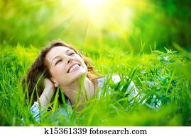 Beautiful Young Woman Outdoors. Enjoy Nature Beautiful Young Woman Outdoors. Enjoy Nature