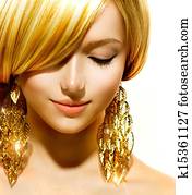 Beauty Blonde Fashion Model Girl With Golden Earrings 