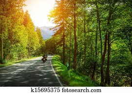 Biker on mountainous road
