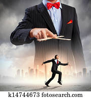 Businessman puppeteer