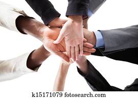 Businesspeople Stacking Hands
