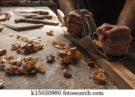 carpenter working with plane carpenter working with plane