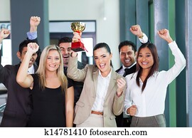 cheerful business team winning an award