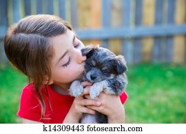 children girl kissing her puppy chihuahua doggy children girl kissing her puppy chihuahua doggy