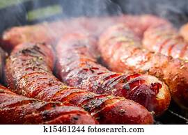 Closeup of sausage on the grill Closeup of sausage on the grill