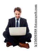 Corporate male executive with laptop