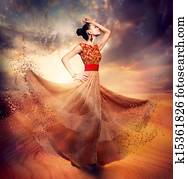 Dancing Fashion Woman wearing Blowing Long Chiffon Dress Dancing Fashion Woman wearing Blowing Long Chiffon Dress