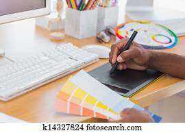 Designer using graphics tablet Designer using graphics tablet