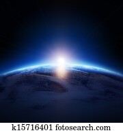 Earth sunrise over cloudy ocean with no stars