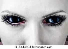 Evil black female zombie eyes. Evil black female zombie eyes.