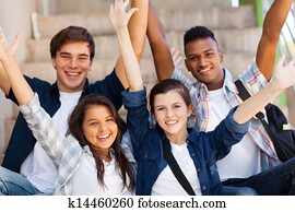 excited high school students with arms outstretched