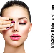 Fashion Beauty. Woman With Colorful Nails and Luxury Makeup Fashion Beauty. Woman With Colorful Nails and Luxury Makeup