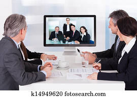 Group Of Businesspeople In Video Conference