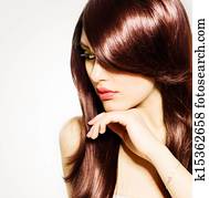 Hair. Beautiful Brunette Girl with Healthy Long Brown Hair 