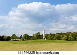 Man Playing Golf At Course Man Playing Golf At Course