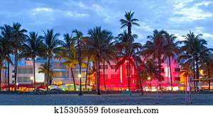 Miami Beach, Florida hotels and restaurants at sunset on Ocean Drive, world famous destination for it's nightlife, beautiful weather, Art Deco architecture and pristine beaches Miami Beach, Florida hotels and restaurants at sunset on Ocean Drive, world famous destination for it's nightlife, beautiful weather, Art Deco architecture and pristine beaches