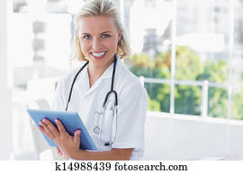 Nurse holding a tablet computer