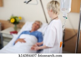 Nurse Talking To Patient