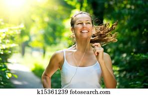 Running woman. Outdoor Workout in a Park Running woman. Outdoor Workout in a Park