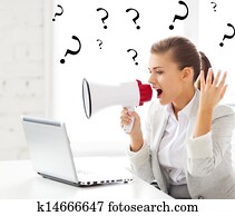 strict businesswoman shouting in megaphone