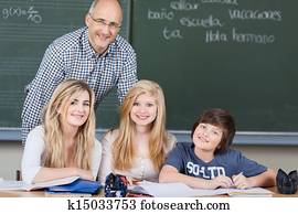 Students in class with their teacher