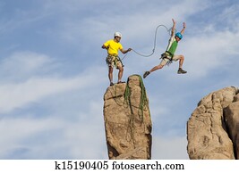 Successful climbing team. Successful climbing team.