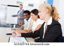 unternehmensleiter, nehmen notizen, während, a, versammlung