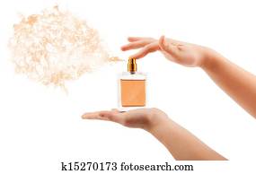woman hands spraying perfume woman hands spraying perfume