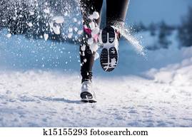 Woman running in winter Woman running in winter