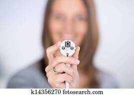Woman With Electric Plug