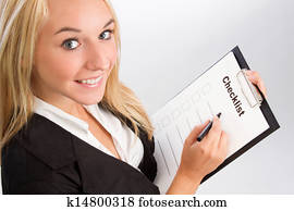Young woman with checklist over shoulder shot