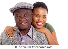 african daughter and senior father close up