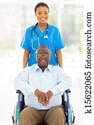 african health care worker and senior patient