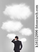 Back pose of a business person thinking