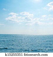 blue sea and clouds over it