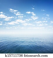 blue sky over sea or ocean water surface
