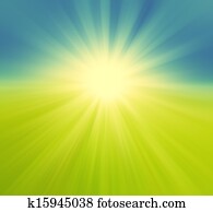 Blurry green field and blue sky with summer sun burst, retro background, pastel tones Blurry green field and blue sky with summer sun burst, retro background, pastel tones
