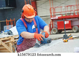 Builder worker at construction site Builder worker at construction site