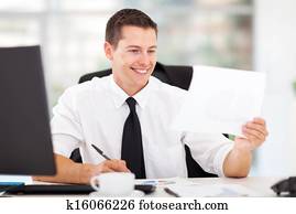 businessman writing report