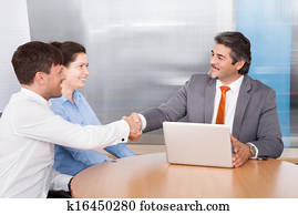 Consultant Shaking Hand With Man Consultant Shaking Hand With Man