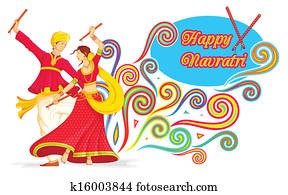 Couple playing Dandiya on Navratri Couple playing Dandiya on Navratri