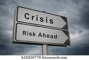 Crisis, Risk Ahead road sign.