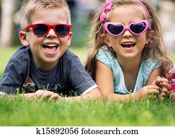 Cute small kids with fancy sunglasses