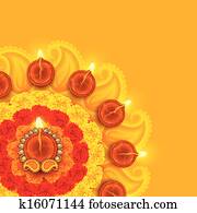 Decorated Diwali Diya on Flower Rangoli Decorated Diwali Diya on Flower Rangoli
