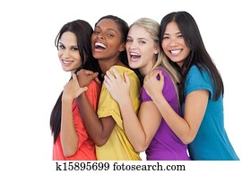 Diverse young women laughing at camera and embracing Diverse young women laughing at camera and embracing