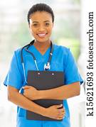 female african medical nurse holding clipboard