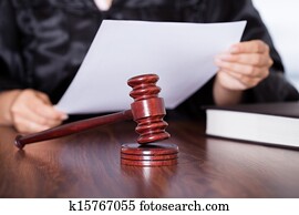 Female Judge Reading Verdict Female Judge Reading Verdict