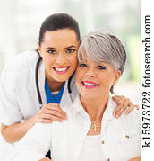 friendly nurse and senior patient