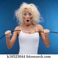 Funny girl having problem with electricity. Electrical shock Funny girl having problem with electricity. Electrical shock